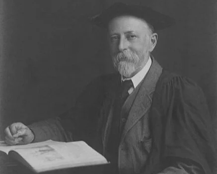 Edwin Cannan, whose advocacy of a materialist definition of economics Lionel Robbins challenged.